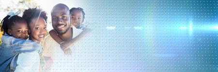 Digital composite of Family piggy backs with blue smart tech transitionの写真素材