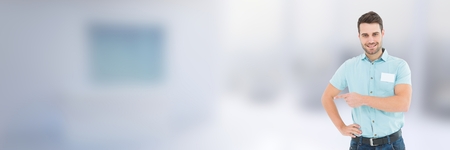 Digital composite of Worker in front of blurred and copy space backgroundの写真素材