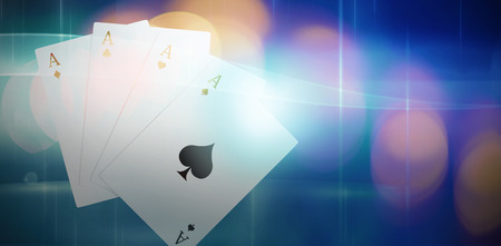 Digital 3D image playing cards against futuristic bright blue background