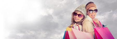 Digital composite of Friends Shopping with cloudy sky transitionの写真素材