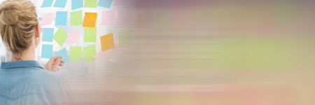 Digital composite of Back of woman looking at sticky notes and motion blur transition