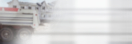 Digital composite of Construction Worker in front of construction siteの写真素材