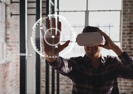 Digital composite of Man in VR headset touching interface against gym background