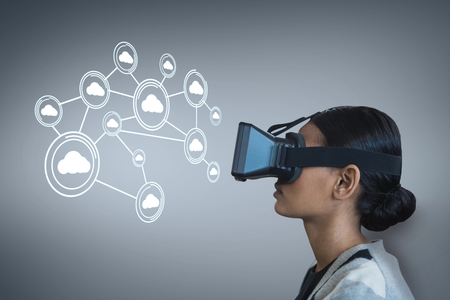 Digital composite of Woman in VR headset looking at interface against purple background