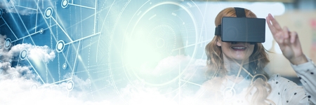 Digital composite of Woman Wearing VR Headset with graphics effects