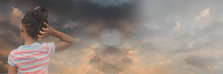 Digital composite of Thinking girl with cloudy transition