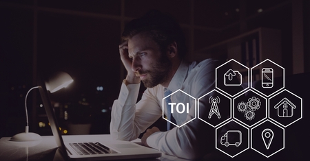 Digital composite of Icons against worried man photoの写真素材