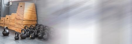 Digital composite of Kettlebells in Gym with transitionの写真素材