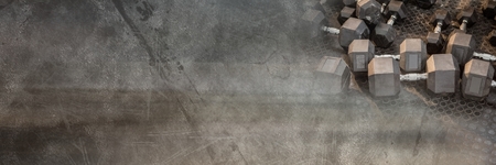 Digital composite of Dumbbells in Gym with transitionの写真素材