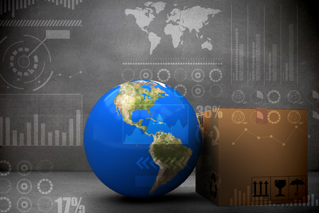 3D image of planet Earth by cardboard box against grey roomの写真素材