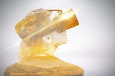 Rear view of businesswoman wearing virtual reality glasses against beautiful african scene