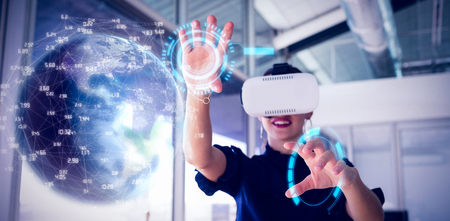 Earth globe against female executive using virtual reality simulator
