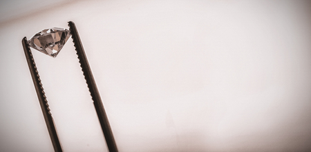 Diamond on tweezer at workhopの写真素材