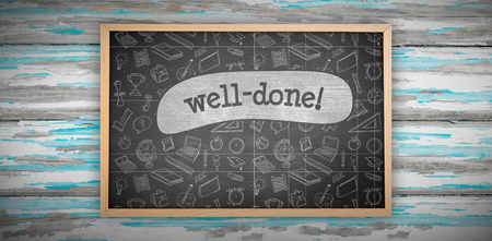 Chalkboard against well-done! against black backgroundの写真素材