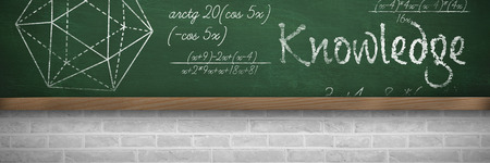 Knowledge text against white background against greenboard on wall in schoolの写真素材