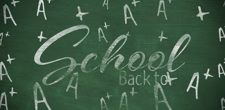 Back to school text over white background against green backgroundの写真素材