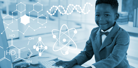 Digital image of atomic structure  against portrait of smiling businessman using computer at deskの写真素材