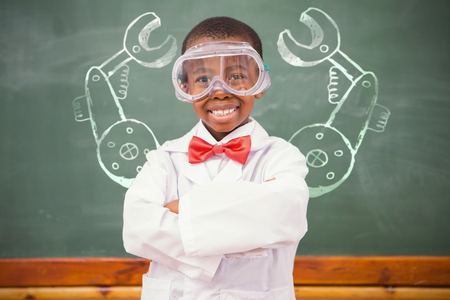 Illustrative image of hand tool against chemistry pupil smiling at camera with arms crossedの写真素材