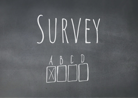 Digital composite of Survey graphics over blackboardの写真素材