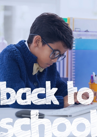 Digital composite of Back to school text against office kid boy writing backgroundの写真素材
