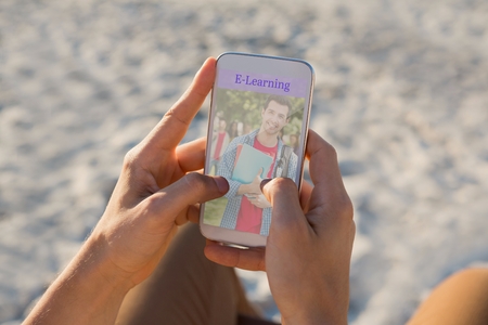 Digital composite of Person using a phone  with e-learning information in the screen