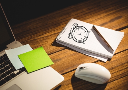 Digital composite of Clock drawing of time on notepad with laptop