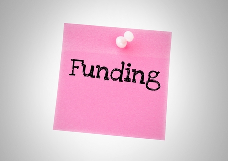 Digital composite of Funding text written on sticky noteの写真素材