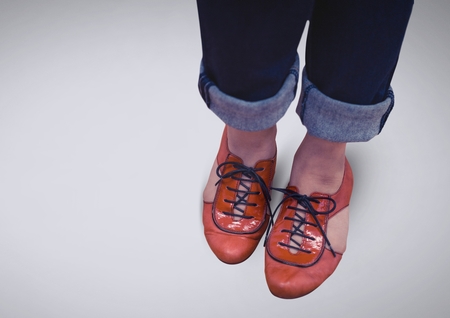 Digital composite of Dainty woman's feet and shoes with bright backgroundの写真素材