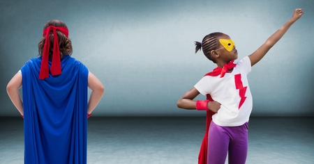 Digital composite of Superhero kids in roomの写真素材
