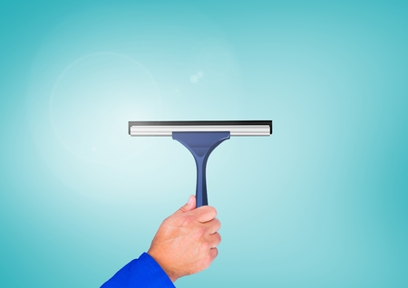 Digital composite of Hand holding window cleanerの写真素材