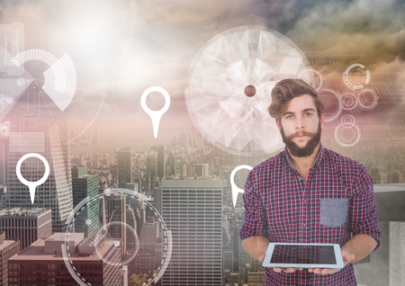 Digital composite of Man Holding tablet and City with marker location pointers and interfaceの写真素材