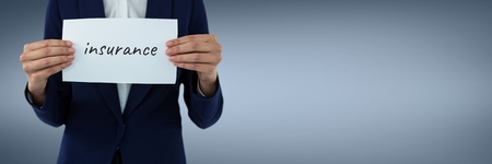 Digital composite of Woman holding a paper with the word insuranceの写真素材