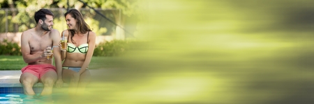 Digital composite of Couple  at Swimming pool with summer green haze transitionの写真素材