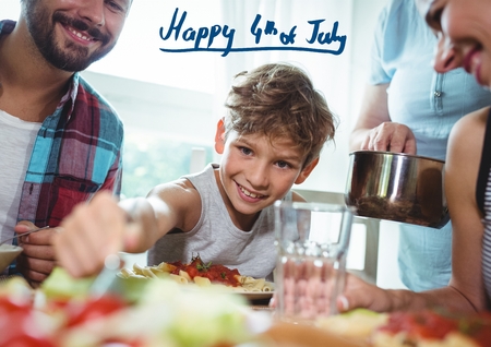 Digital composite of Smiling family having lunch for independence dayの写真素材