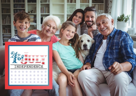 Digital composite of Smiling family of a couch for the 4th of Julyの写真素材