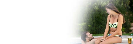Digital composite of Couple in Swimming pool with transitionの写真素材