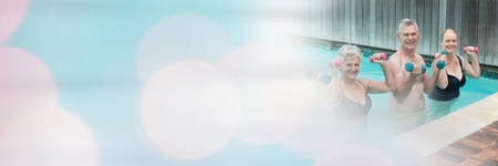 Digital composite of Old people exercising in Swimming pool with transitionの写真素材