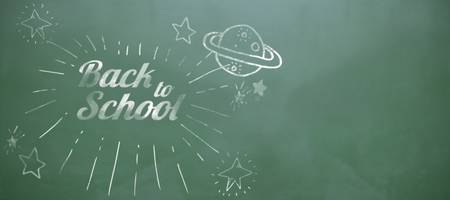 Composite image of Saturn and stars against green chalkboardの写真素材