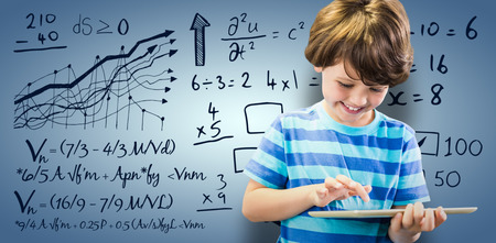Smiling boy using digital tablet against purple vignette