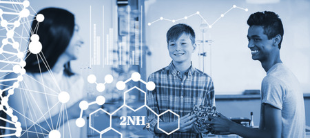 DNA helix structure against white background against happy school kids experimenting molecule model in laboratoryの写真素材