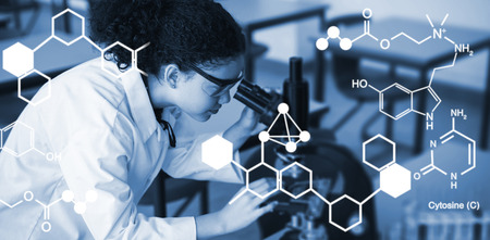 Digitally generated image of chemical structure against attentive schoolgirl looking through...