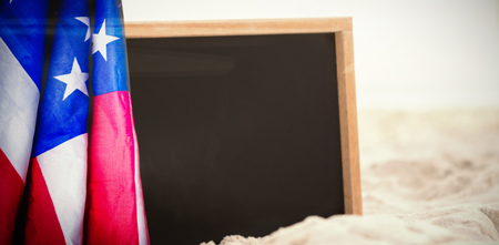 Flare against blank slate in sandの写真素材