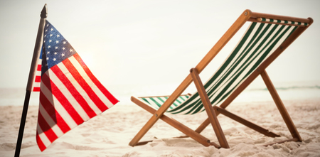 Light with a white background against beach chairs on tropical sand beachの写真素材