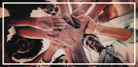 Creative team putting their hands together in circleの写真素材