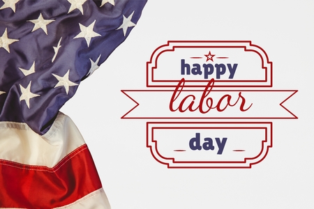 Digital composite of Labor day text over US flag