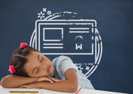 Digital composite of Student girl sleeping on a table against blue blackboard with school and education graphicの写真素材