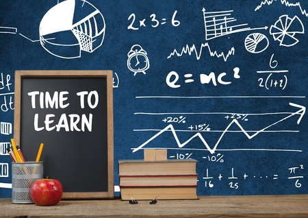Digital composite of Time to learn Desk foreground with blackboard graphics of math science...