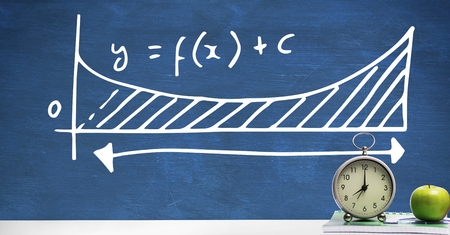 Digital composite of Clock and apple on Desk foreground with blackboard graphics of equations formula diagramの写真素材