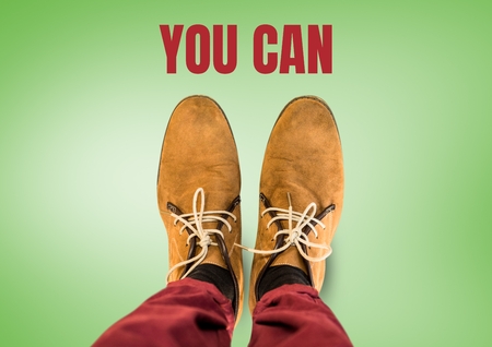 Digital composite of You can text and Brown shoes on feet with green backgroundの写真素材