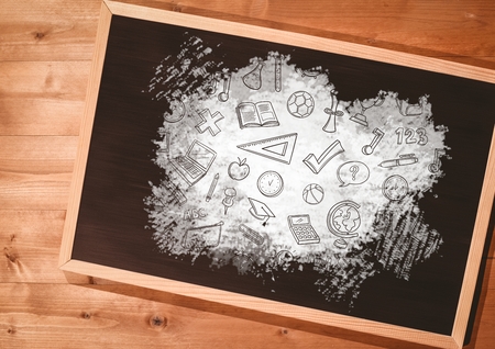 Digital composite of education graphics on blackboardの写真素材